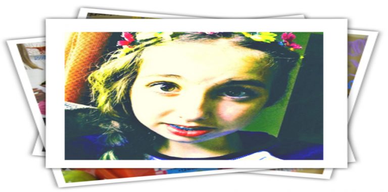 Image of Mya Kidson, 14 year old girl with flowers in her hair.