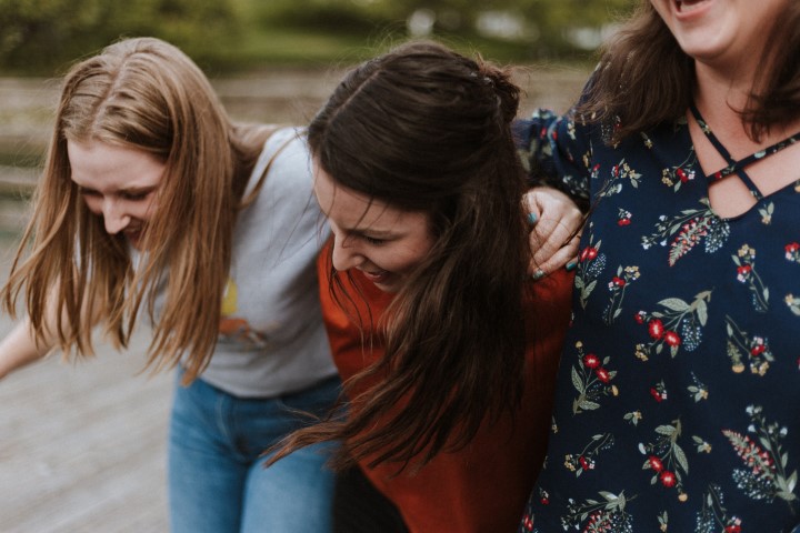 two girls laughing