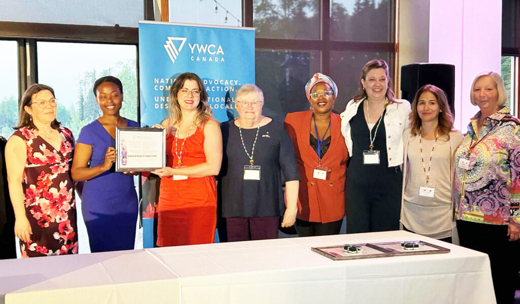 Members of the YWCA Ontario Coalition accept the YWCA Canada Advocacy Award for 2022