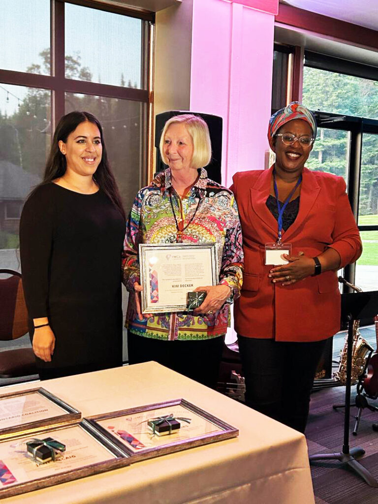 Kim Decker, CEO, between Ranata (YWCA Canada board member) and Aline Nizigama. Kim was awarded the Carolyn B. Bray award for spirit, dedication and creativity