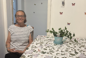 CM in her new home with butterflies on the wall