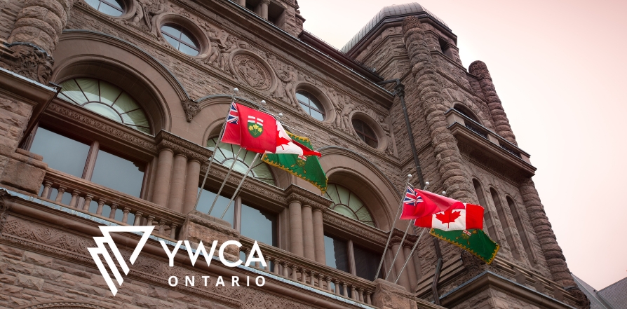 Close-up of Ontario Legislature with the YWCA ON logo bottom left