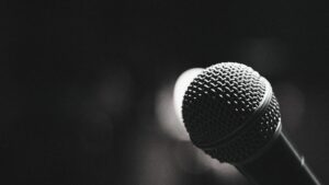 Black and white photo of a microphone close up