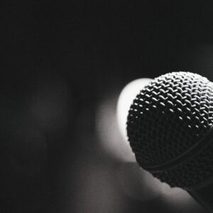 Black and white photo of a microphone close up