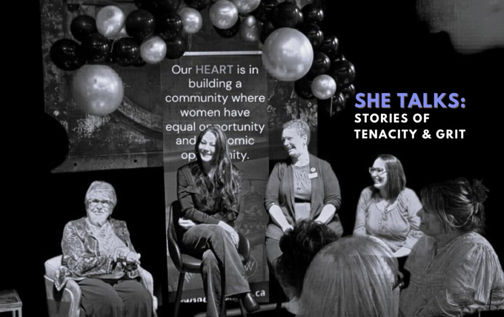 All four SheTalks speakers sitting at the front of the room at The Underwing, smiling at something an audience member has said.