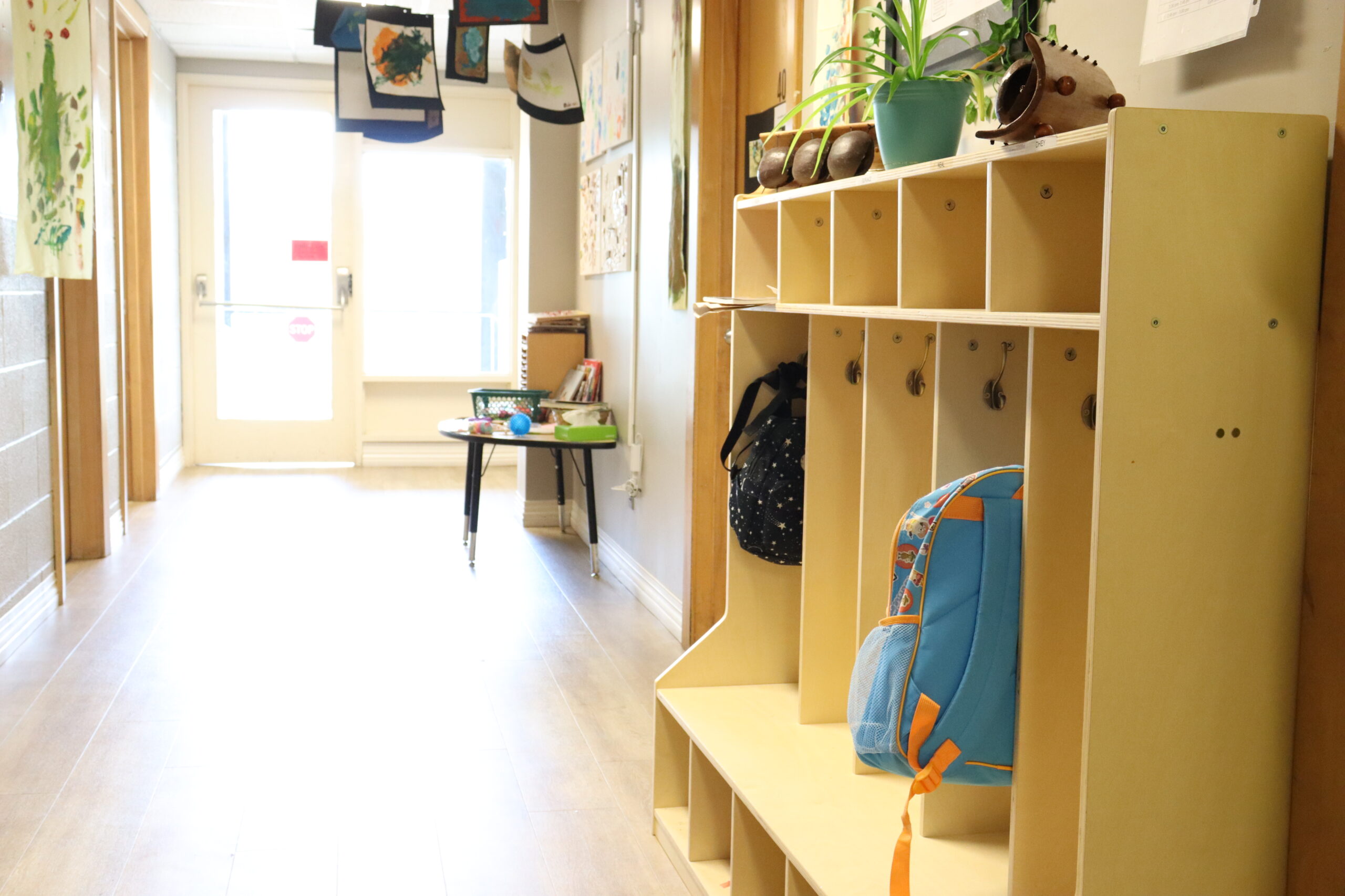 an empty, sunlit child care hallway